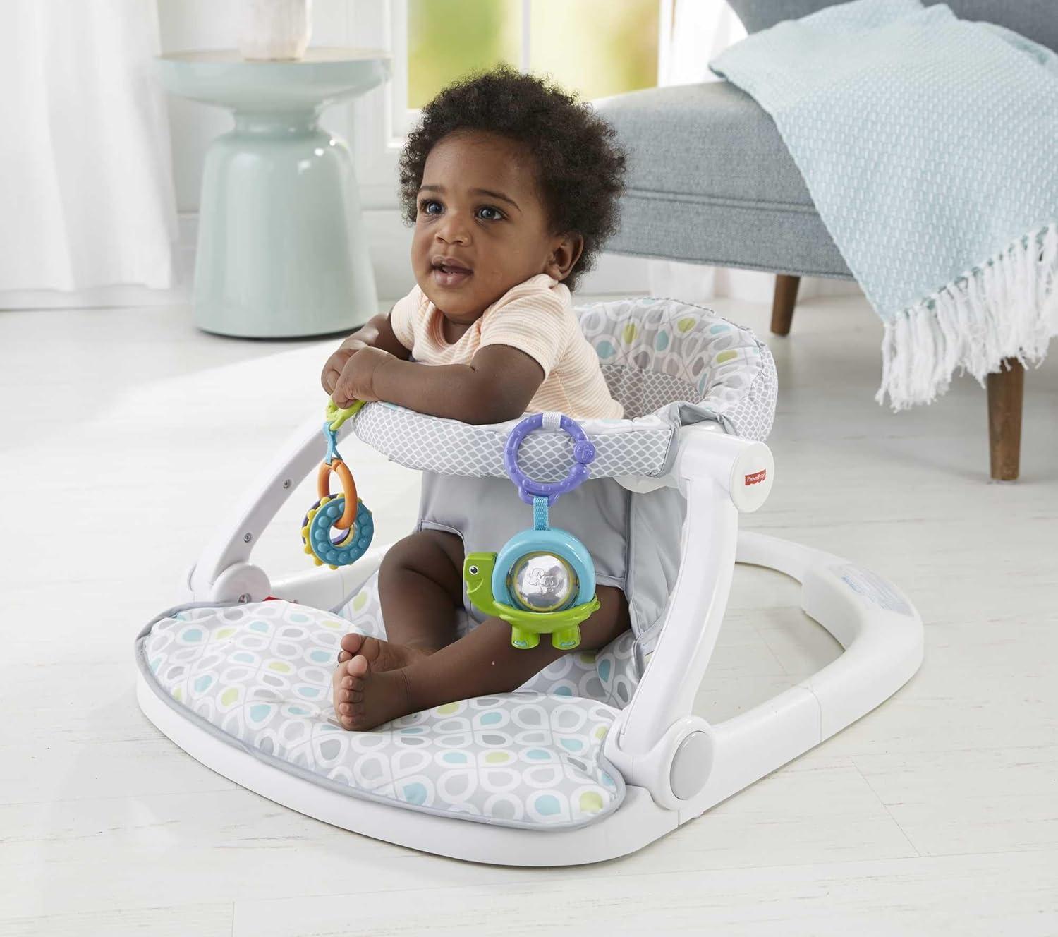 imageFisherPrice Portable Baby Chair SitMeUp Floor Seat with Developmental Toys ampamp Machine Washable Seat Pad Froggy1 Count Pack of 1