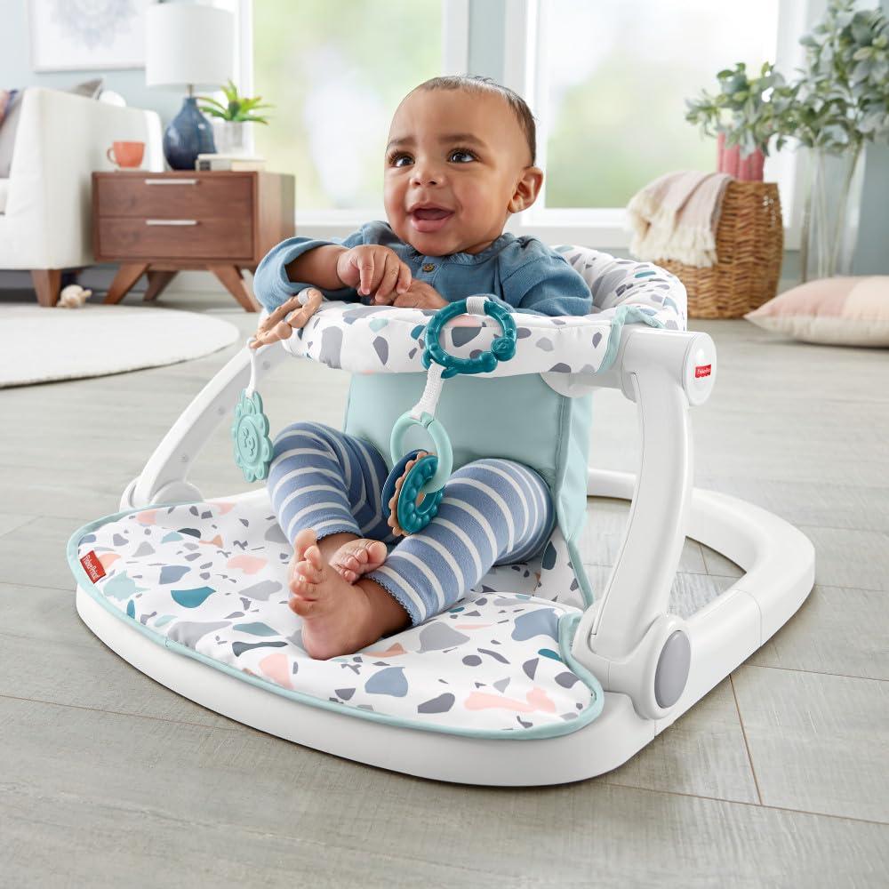 imageFisherPrice Portable Baby Chair SitMeUp Floor Seat with Developmental Toys ampamp Machine Washable Seat Pad Froggy1 Count Pack of 1
