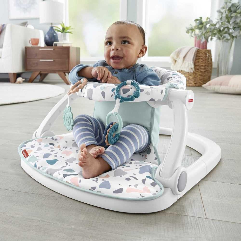 imageFisherPrice Portable Baby Chair SitMeUp Floor Seat with Developmental Toys ampamp Machine Washable Seat Pad Froggy1 Count Pack of 1