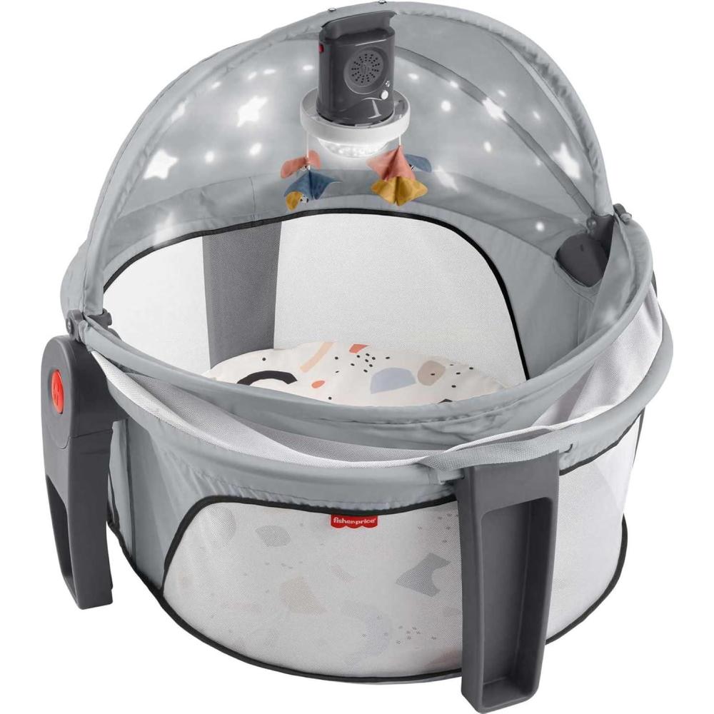 imageFisherPrice Portable Baby Bassinet Deluxe OnTheGo Projection Dome Travel Play Space for Newborns with Lights Music ampamp Canopy Paper ShapesGray