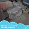 Fisher-Price Portable Baby Crib Soothing View Projection Bassinet with Lights Music Vibrations & Slim Fold for Newborns 0+ Months, Fawning Leaves(Fawning Leaves)