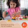 Fisher-Price Wood Toddler Toy Shape Stacker, 13-Piece Wooden Sorting Activity for Fine Motor Play Preschool Kids Ages 2+ Years