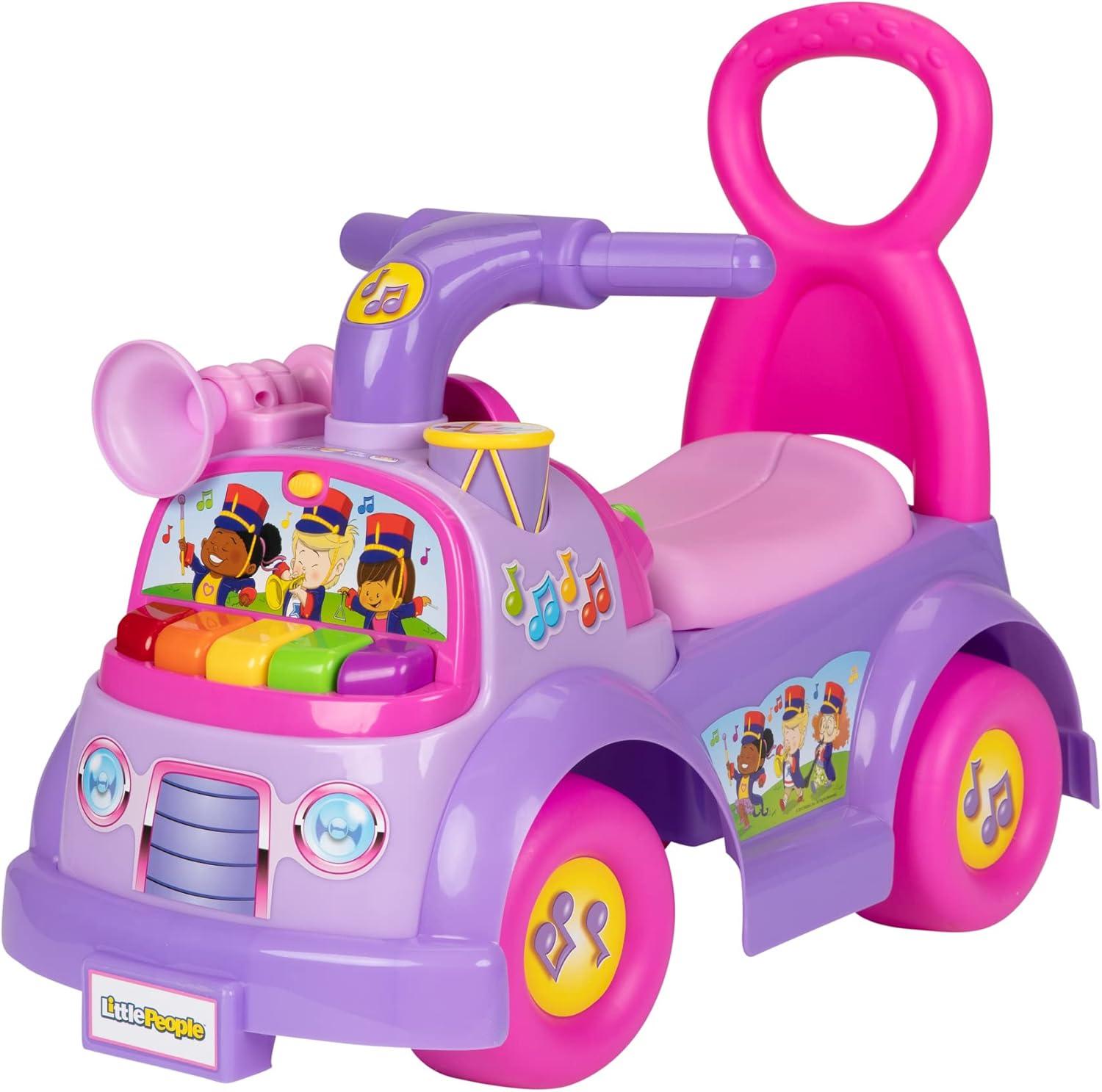 imageLittle People FisherPrice Music Parade Purple RideOn Plays 5 Marching Tunes ampamp Other Sounds Perfect for Toddler Boys ampamp Girls Ages 1 2 ampamp 3 Years Old Helps Foster Motor SkillsPink Purple