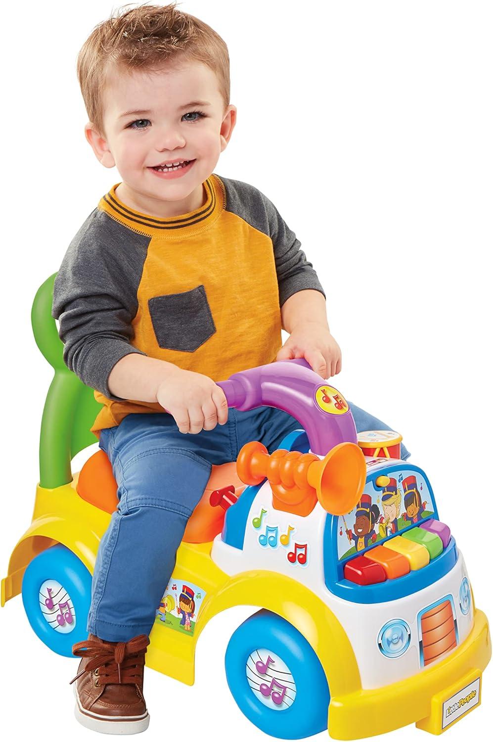 imageLittle People FisherPrice Music Parade Purple RideOn Plays 5 Marching Tunes ampamp Other Sounds Perfect for Toddler Boys ampamp Girls Ages 1 2 ampamp 3 Years Old Helps Foster Motor SkillsMulticolor